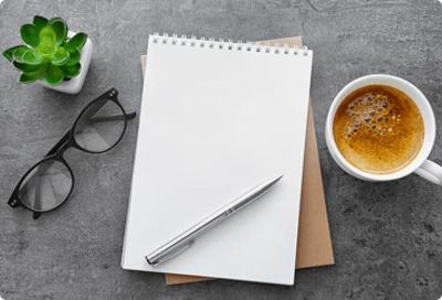 notebook glasses coffee